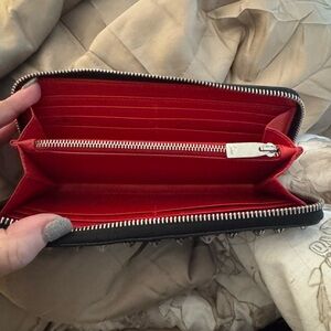 Louboutin wallet excellent condition studs are great!